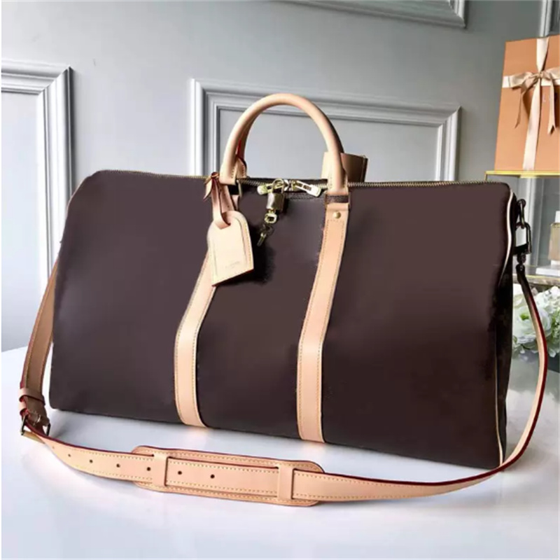 Designers Duffel Bags 45CM 50CM 55CM luxury large capacity travel sale High quality women men Genuine Leather shoulder Fashion bag carry rivets with lock head-------AAAAA
Designers Duffel Bags 45CM 50CM 55CM luxury large capacity travel sale High quality women men Genuine Leather shoulder Fashion bag carry rivets with lock head-------AAAAA