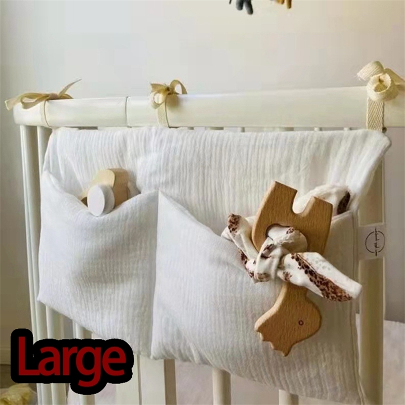 47x26cm Large Portable Baby Bed Storage Bag Cotton born Crib Organizer Toy Diaper Pocket For Bed Accessories Nappy Store Bags 220816
47x26cm Large Portable Baby Bed Storage Bag Cotton born Crib Organizer Toy Diaper Pocket For Bed Accessories Nappy Store Bags 220816