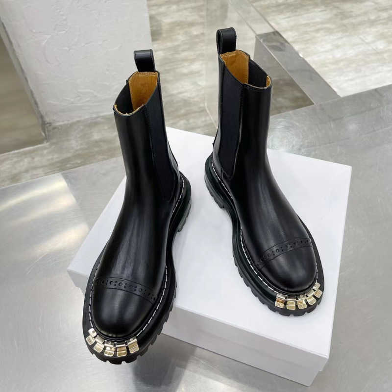 Black Elasticated chunky platform biker ankle boots leather Martin booties with notched sole heavy duty luxury designers brands shoes for
Black Elasticated chunky platform biker ankle boots leather Martin booties with notched sole heavy duty luxury designers brands shoes for