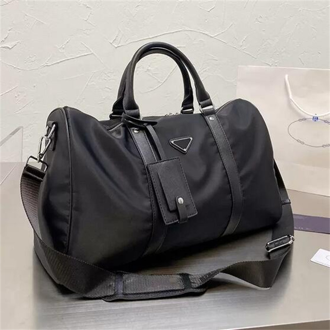 Fashion luxury men women high-quality travel duffle bags brand designer luggage handbags large capacity sport bag, Black
Fashion luxury men women high-quality travel duffle bags brand designer luggage handbags large capacity sport bag, Black