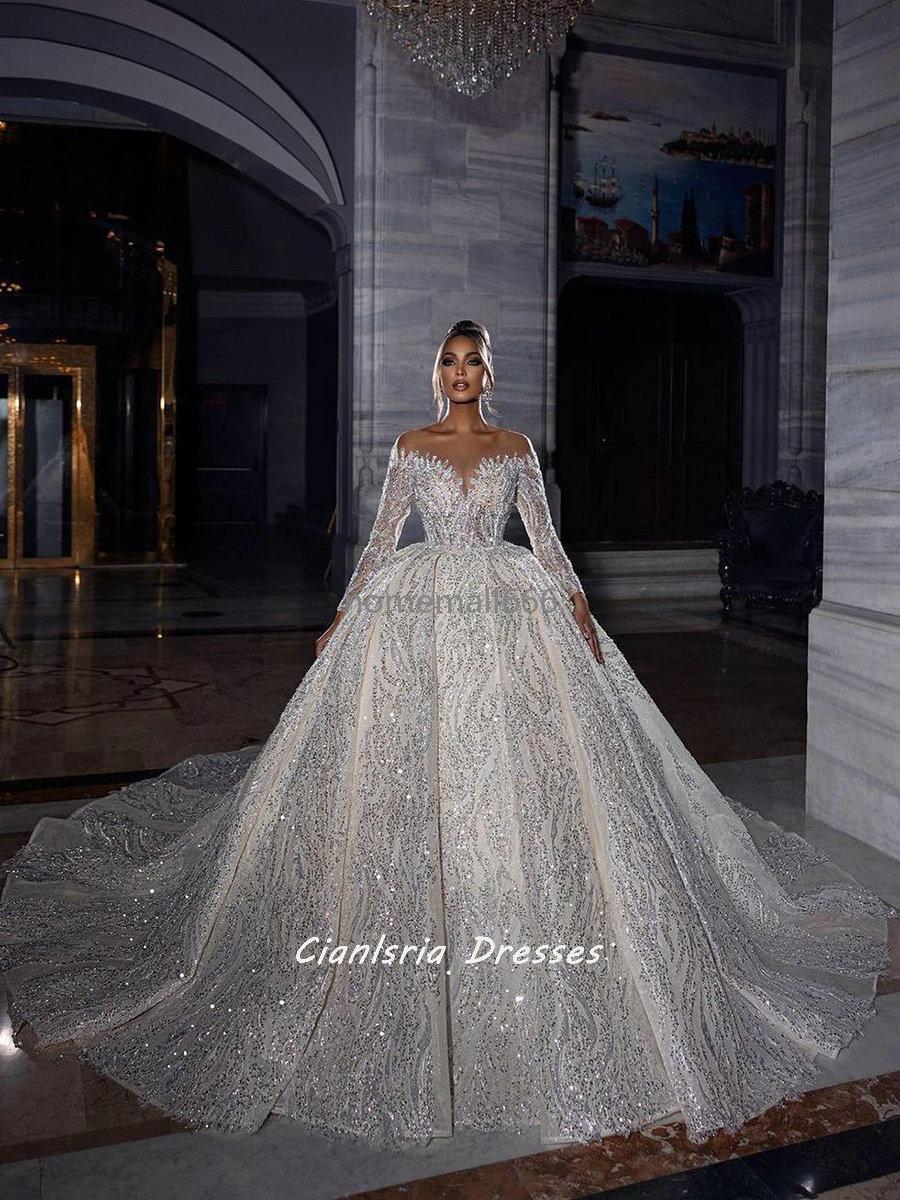 Sparkly Sequined Crystal Beading Dubai Wedding Dress Ball Gown Illusion Long Sleeve Off The Shoulder Saudi Arabic Bridal Gown Plus Size, White
Sparkly Sequined Crystal Beading Dubai Wedding Dress Ball Gown Illusion Long Sleeve Off The Shoulder Saudi Arabic Bridal Gown Plus Size, White