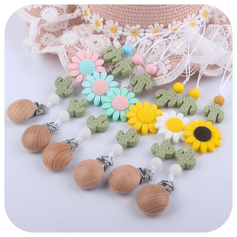 Pacifiers# Sun Flower Style Food Grade Silicone Cactus Dummy Chain Baby Pacifier Clip For Infant Nipple Holder Accessories BPA FreePacifiers
Pacifiers# Sun Flower Style Food Grade Silicone Cactus Dummy Chain Baby Pacifier Clip For Infant Nipple Holder Accessories BPA FreePacifiers