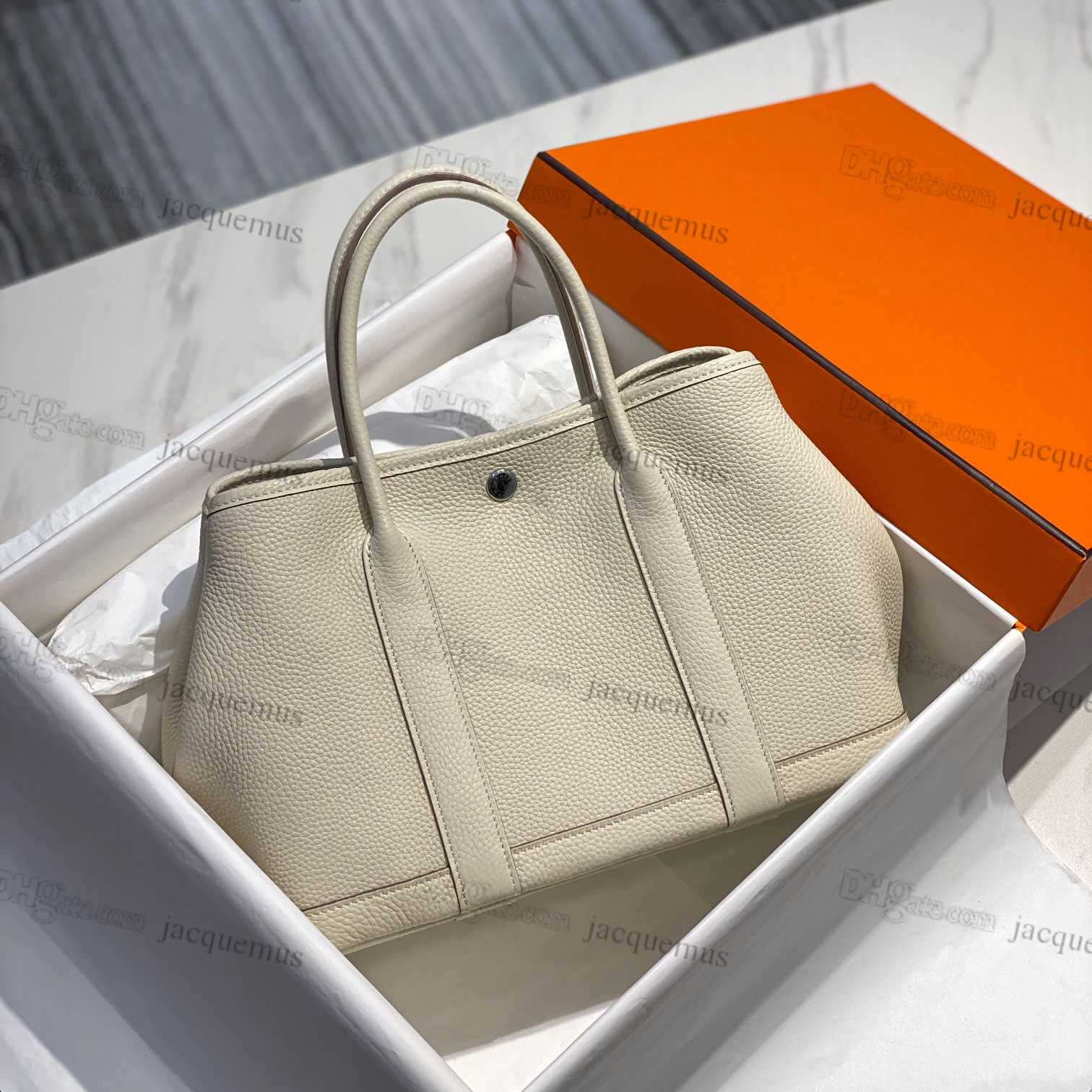 7A quality garden luxury party bags fashion genuine leather calfskin large tote bag womens clutch handbags designer
7A quality garden luxury party bags fashion genuine leather calfskin large tote bag womens clutch handbags designer