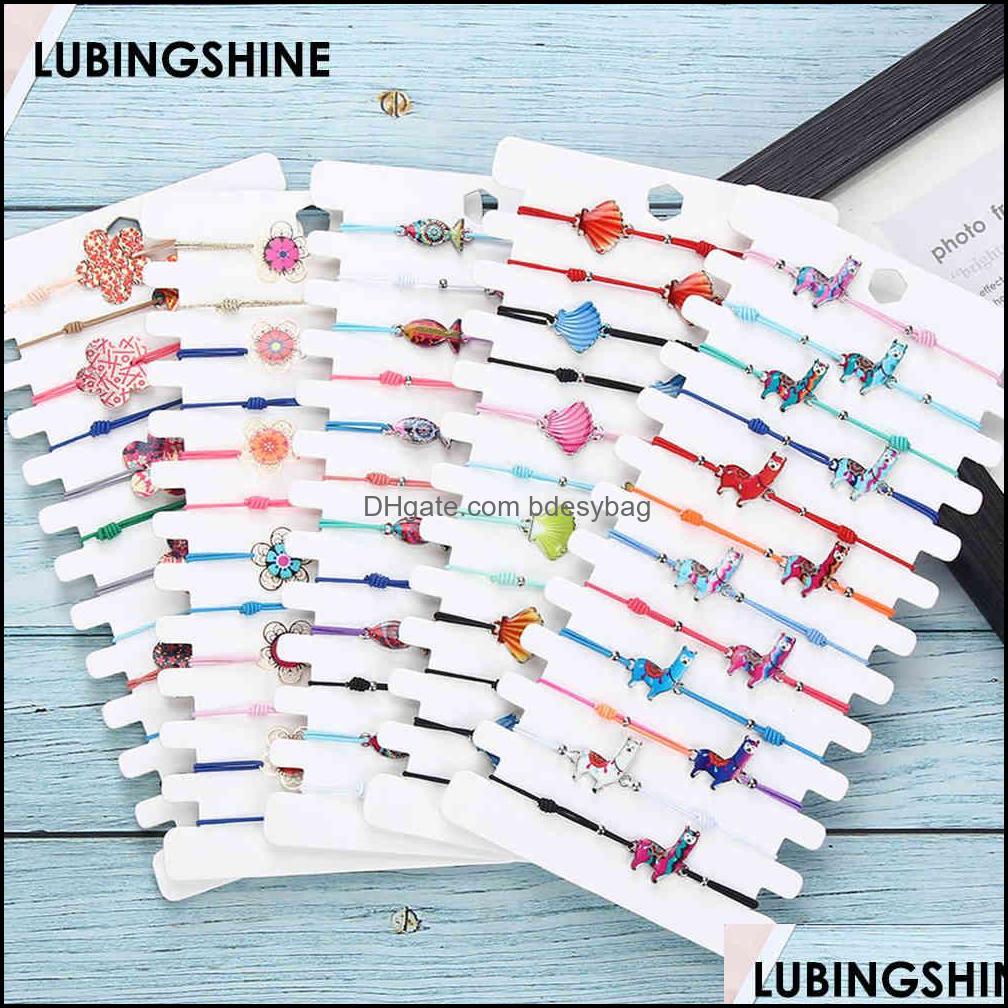 Charm Bracelets Jewelry Colorf Cartoon Shell Animal Flowers Bracelet 12Pcs/Set Vintage Fashion Elastic Rope Dha0F
Charm Bracelets Jewelry Colorf Cartoon Shell Animal Flowers Bracelet 12Pcs/Set Vintage Fashion Elastic Rope Dha0F