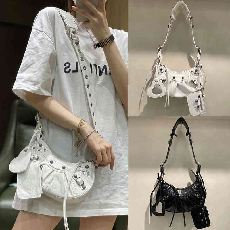 women's totes bags balencaigass OEM Le cagole fold crescent three in one rivet locomotive oil wax skin underarm female 5a quality, White
women's totes bags balencaigass OEM Le cagole fold crescent three in one rivet locomotive oil wax skin underarm female 5a quality, White