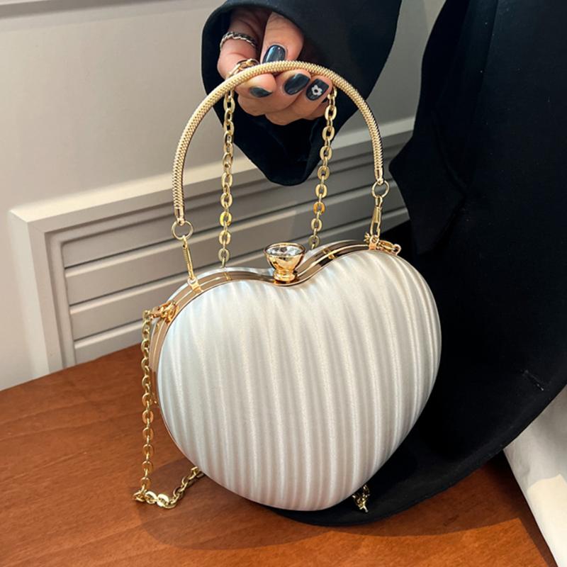 Evening Bags Women's Heart Shaped Shoulder Crossbody Bag PU Leather Stripe Handbag With Metal Handle 2022 Luxury Designer Chain Messenge, Silver bag
Evening Bags Women's Heart Shaped Shoulder Crossbody Bag PU Leather Stripe Handbag With Metal Handle 2022 Luxury Designer Chain Messenge, Silver bag