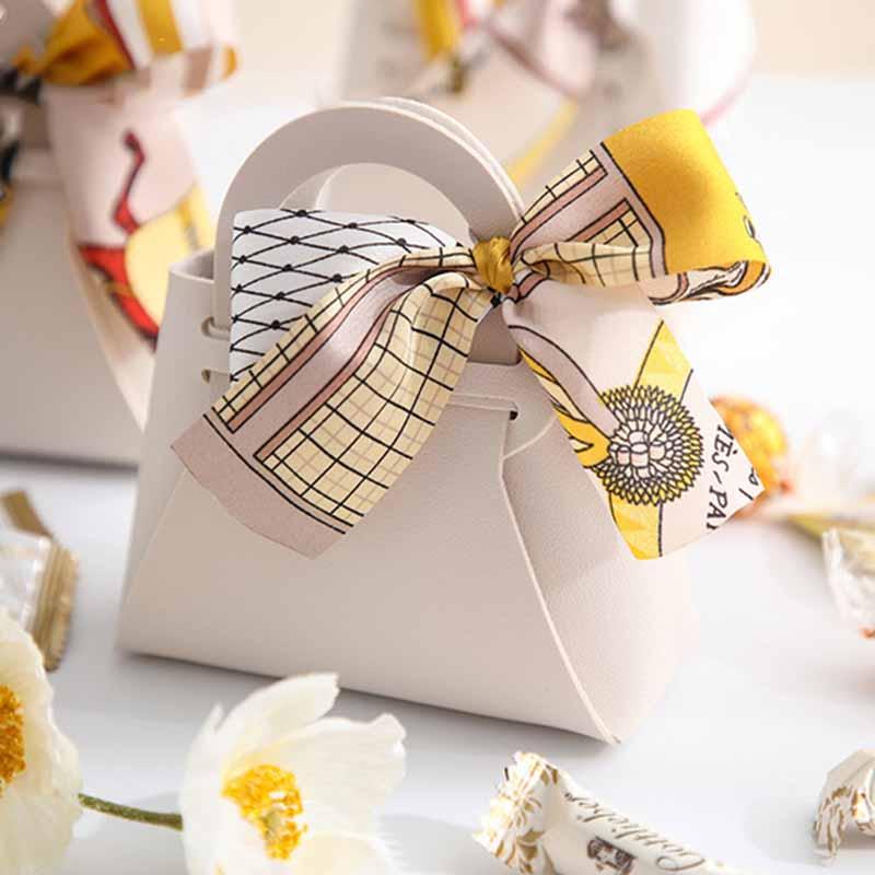 Gift Wrap Temperament With Hand Box Candy Bag PU Leather Ribbon Bow Handbag ShapeGift 
Gift Wrap Temperament With Hand Box Candy Bag PU Leather Ribbon Bow Handbag ShapeGift