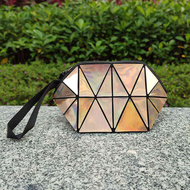 Net red laser Lingge makeup bag female style small portable storage hand change 220518