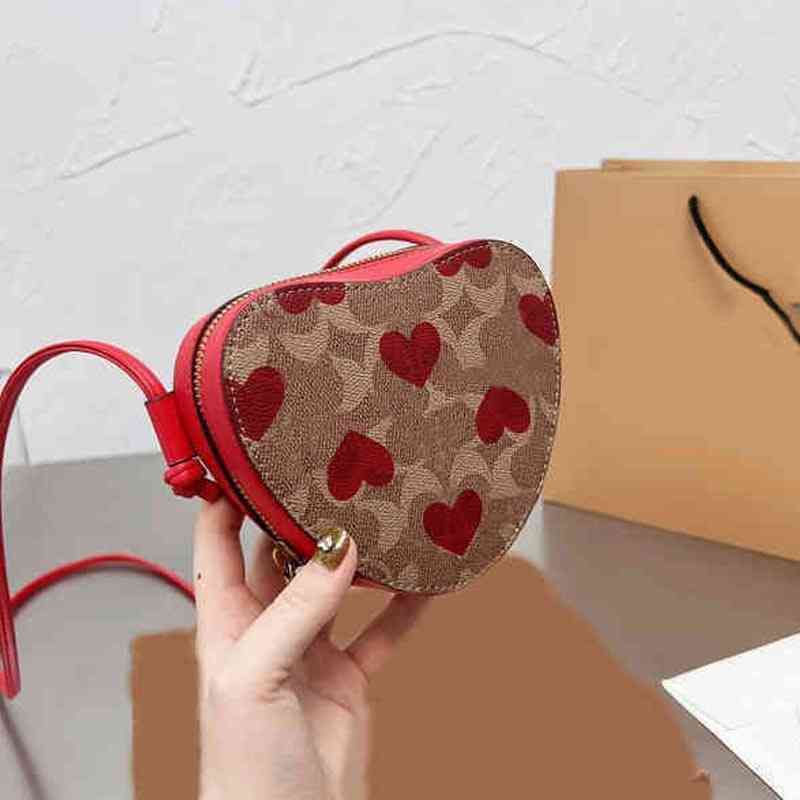 Nxy Evening Bags Totes Heart Shape Women Cute Handbag Knotted Shoulder Straps Leather Designer Crossbody Female Casual Purses 22309, Red
Nxy Evening Bags Totes Heart Shape Women Cute Handbag Knotted Shoulder Straps Leather Designer Crossbody Female Casual Purses 22309, Red