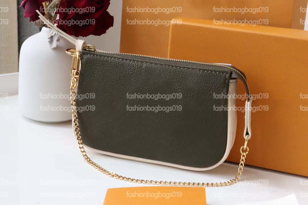 Mini Pochette Bag M46129 Spring Escape embossed Monograms Empreinte leather two-in-one Multi-function Bags Zipped Pockets Shoulder Bags designers M81284
Mini Pochette Bag M46129 Spring Escape embossed Monograms Empreinte leather two-in-one Multi-function Bags Zipped Pockets Shoulder Bags designers M81284
