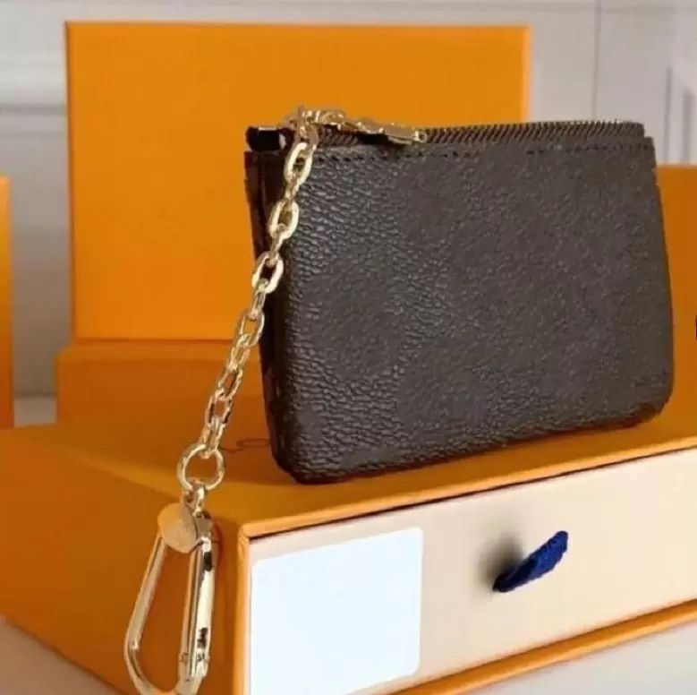 Top Original Quality Fashion key chain Coin bag Wholesale leather wallet for womens short wallets Card holder women purse classic zipper pocket 62650 With Box, Old flower
Top Original Quality Fashion key chain Coin bag Wholesale leather wallet for womens short wallets Card holder women purse classic zipper pocket 62650 With Box, Old flower