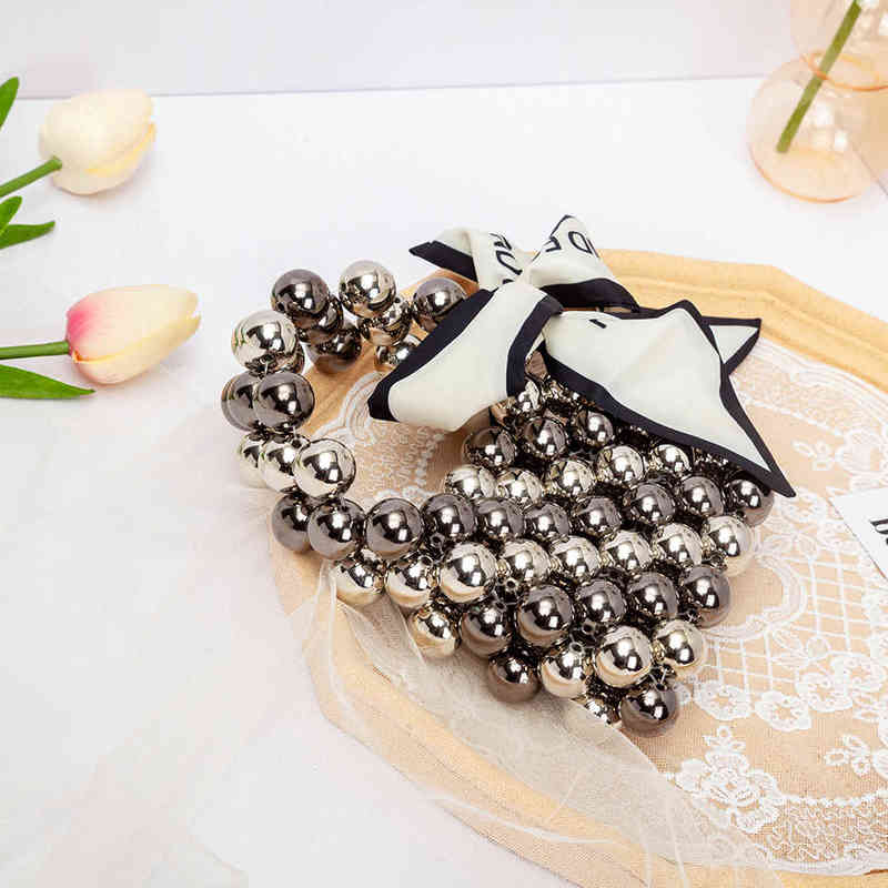 Evening Bag Kawaii Bow Silver Mini Pearl Handbag 2022 New Elegant Designer Cute Hollow Out Beaded Purse and for Women Wedding Party 220622
Evening Bag Kawaii Bow Silver Mini Pearl Handbag 2022 New Elegant Designer Cute Hollow Out Beaded Purse and for Women Wedding Party 220622