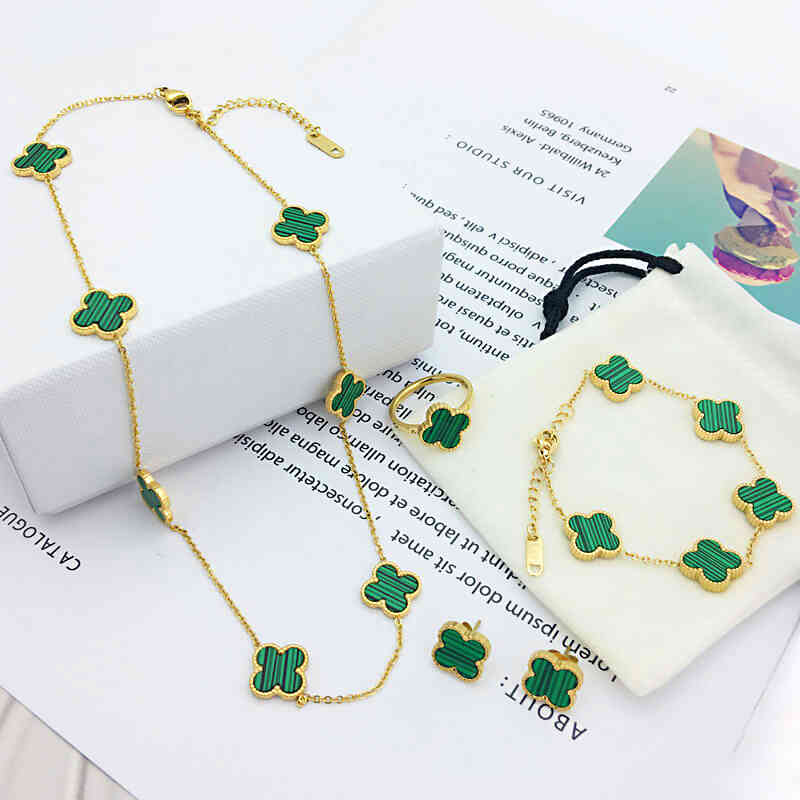 Love 4pcs/set high quality 18k gold plated clover jewelry set stainls steel earrings necklace bracelet ring clover set for women Never Fading
Love 4pcs/set high quality 18k gold plated clover jewelry set stainls steel earrings necklace bracelet ring clover set for women Never Fading