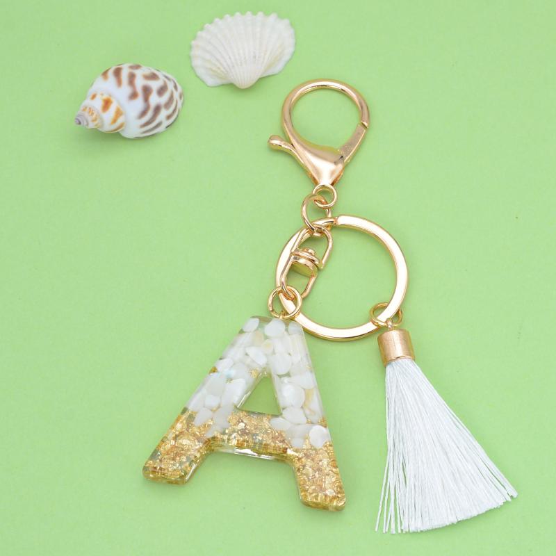 Keychains Style White Tassel Letter Keychain Gold Foil Crystal Glue Fashion 26 English Pendant Charms Small Gift For Couple
Keychains Style White Tassel Letter Keychain Gold Foil Crystal Glue Fashion 26 English Pendant Charms Small Gift For Couple