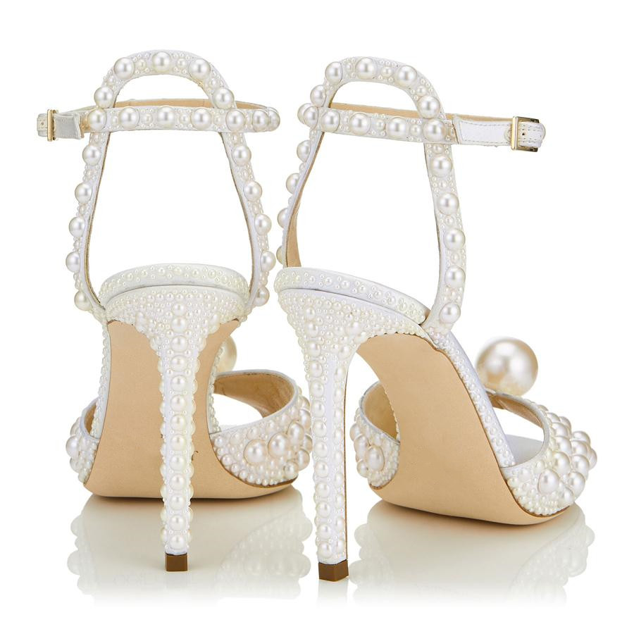 Luxury High Heels Sandals Women's Jimmy London Choo SACORA 100mm Ankle Sling Slingback Pearl Embellished Fish Mouth Diamond Design Bridal Wedding JC EU 35-43
Luxury High Heels Sandals Women's Jimmy London Choo SACORA 100mm Ankle Sling Slingback Pearl Embellished Fish Mouth Diamond Design Bridal Wedding JC EU 35-43