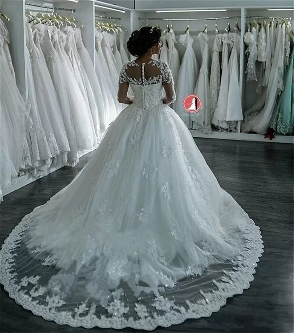 2022 New Dubai Elegant Long Sleeves A-line Wedding Dresses Sheer Crew Neck Lace Appliques Beaded Vestios De Novia Bridal Gowns with Buttons B0408