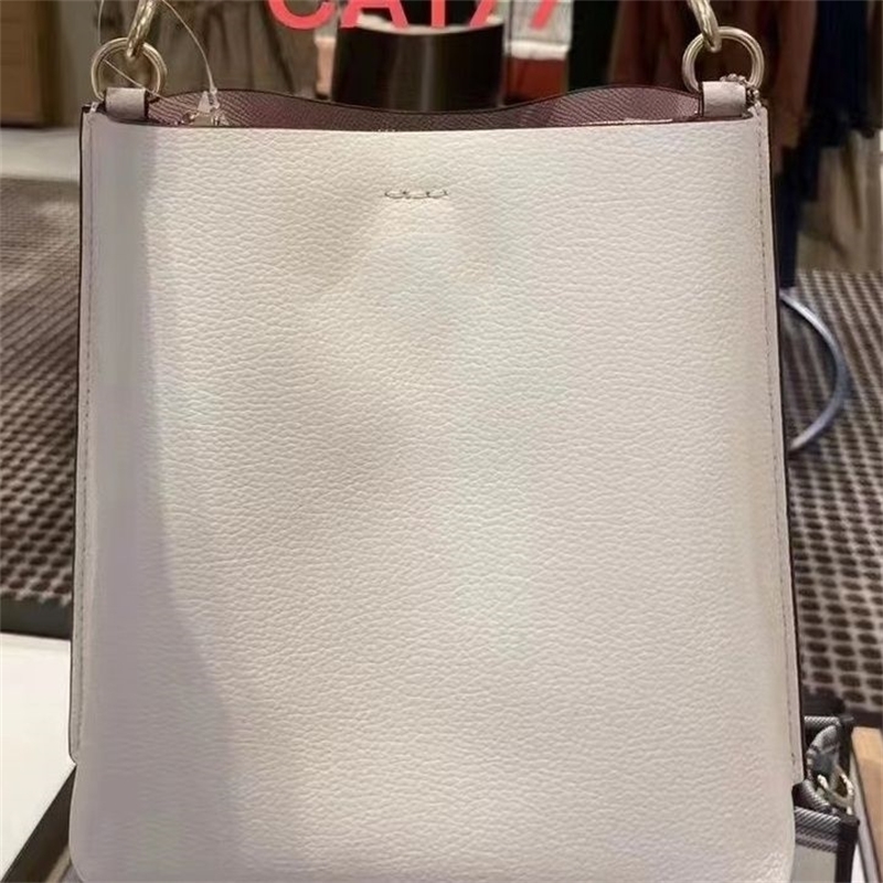 Designer coac Handbags New Bucket Bag B602 Womens Classic Style First Choice in Summer Large Capacity and High Appearance Yzl, Glacier white flower
Designer coac Handbags New Bucket Bag B602 Womens Classic Style First Choice in Summer Large Capacity and High Appearance Yzl, Glacier white flower