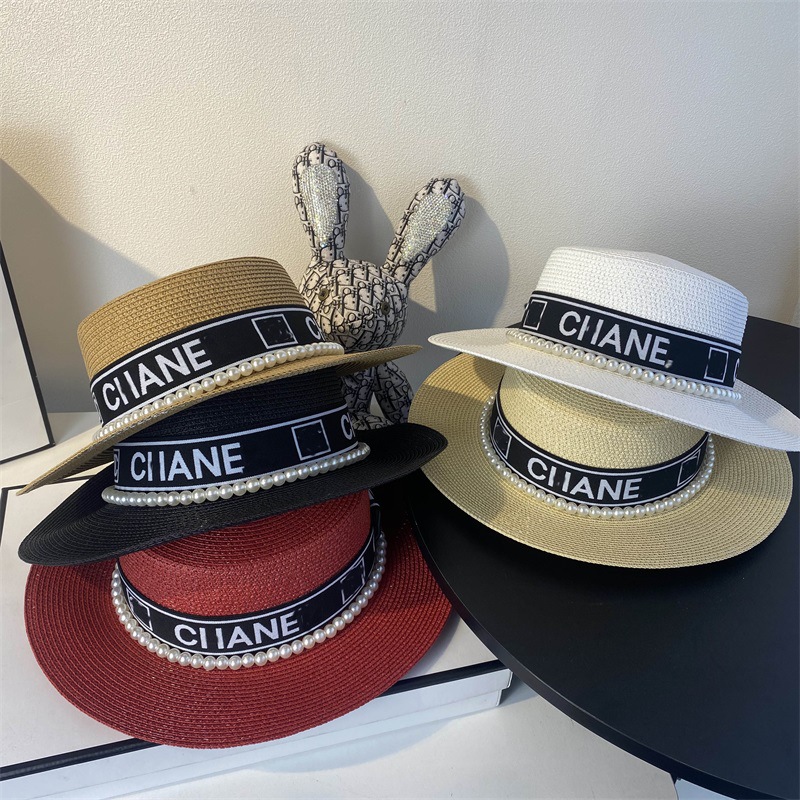 Small fragrance letter Ribbon Pearl flat top straw hat European and American fashion light luxury wind wide brimmed hat retro women's sun visor
Small fragrance letter Ribbon Pearl flat top straw hat European and American fashion light luxury wind wide brimmed hat retro women's sun visor