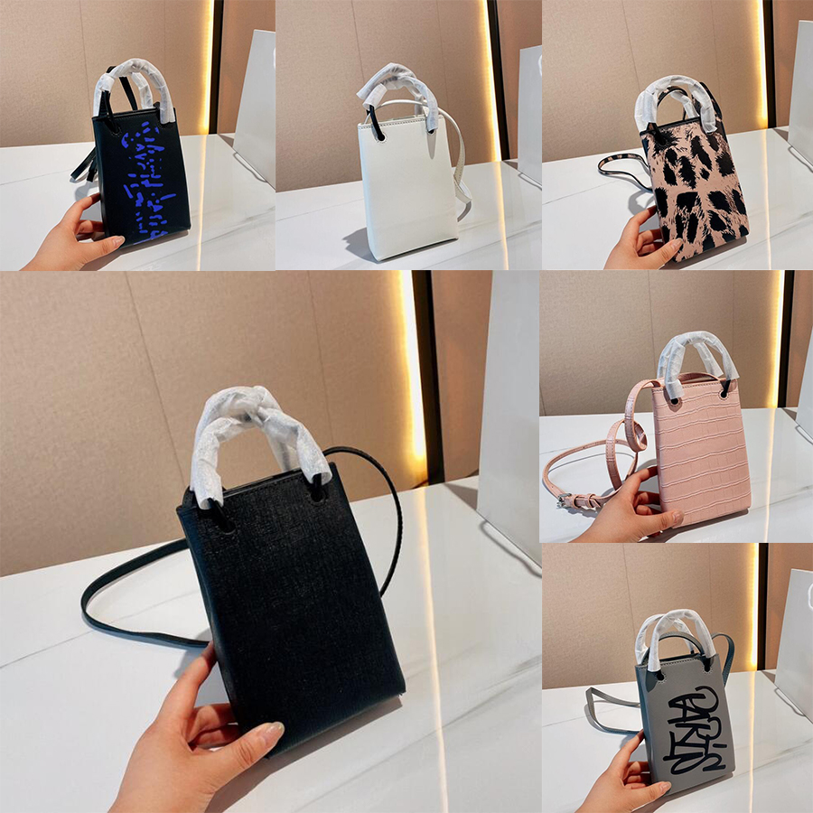 Mini Shopping Bag Crocodile Embossed Leather Phone Holder Bag Squared Tote Crossbody Canvas Designer Balenciagas Handbag Thin Round Handles Shoulder Totebag
Mini Shopping Bag Crocodile Embossed Leather Phone Holder Bag Squared Tote Crossbody Canvas Designer Balenciagas Handbag Thin Round Handles Shoulder Totebag