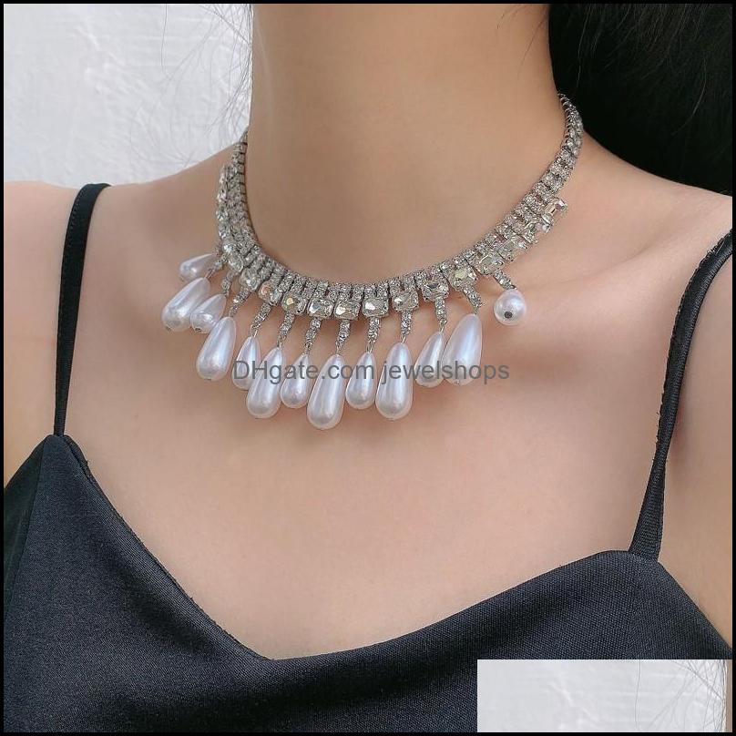 Pendant Necklaces Ladies Style Pearl Water Drop Clavicle Chain Exaggerated Super Flash Rhinestone Luxury Jewelshops Dhmhr
Pendant Necklaces Ladies Style Pearl Water Drop Clavicle Chain Exaggerated Super Flash Rhinestone Luxury Jewelshops Dhmhr