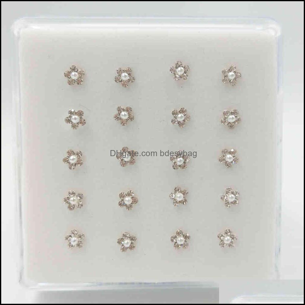 Nose Rings Studs 925 Sterling Sier Stud Fashion Flower Shape Crystal Naso Pin Piercing Nariz Jewelry 20Pcs/Pack Drop Bdesybag Dh1G2
Nose Rings Studs 925 Sterling Sier Stud Fashion Flower Shape Crystal Naso Pin Piercing Nariz Jewelry 20Pcs/Pack Drop Bdesybag Dh1G2