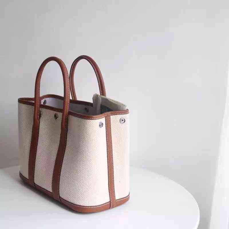Large capacity new canvas with cowhide head bag garden party casual hand one-shoulder miaoqibags color slant tote2024