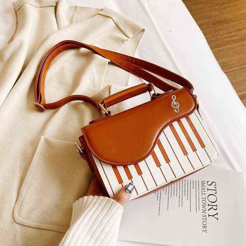 Evening Bags Novelty Piano Key Pattern Pu Leather Crossbody for Women Embroidery Note Shoulder Hand Bag Fashionable Purses and Handbags 220727, Brown bag
Evening Bags Novelty Piano Key Pattern Pu Leather Crossbody for Women Embroidery Note Shoulder Hand Bag Fashionable Purses and Handbags 220727, Brown bag