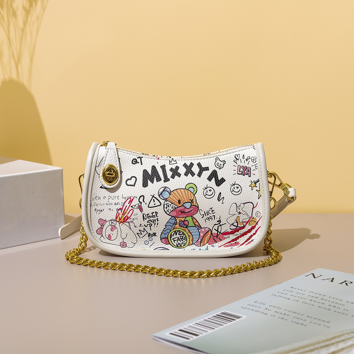 Designer Bags one Shoulder Underarm bag with Bear Graffiti and Metal Hardware 22CM, Gift bags
Designer Bags one Shoulder Underarm bag with Bear Graffiti and Metal Hardware 22CM, Gift bags