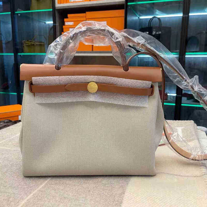 Luxury Designer Handbags Herbag Classic Herme 3139 Canvas Parchment Handbag for Men and Women
Luxury Designer Handbags Herbag Classic Herme 3139 Canvas Parchment Handbag for Men and Women