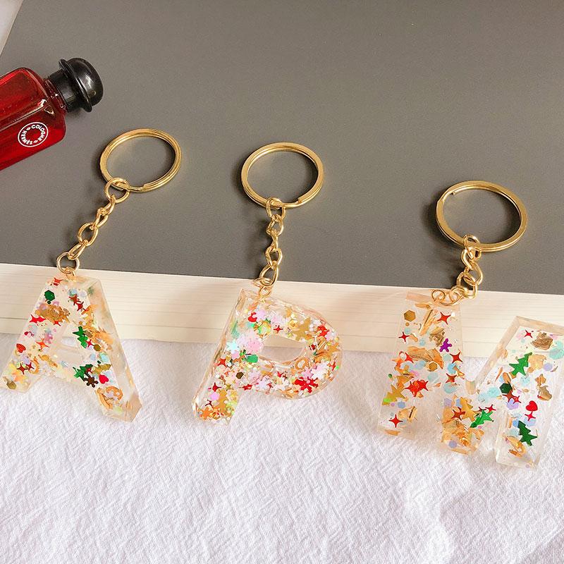 Keychains WANGLUFEI Christmas 26 Letters Resin For Women Alphabet Foil Bag Pendant Charms Handbag Accessories Tassel Key Rings
Keychains WANGLUFEI Christmas 26 Letters Resin For Women Alphabet Foil Bag Pendant Charms Handbag Accessories Tassel Key Rings