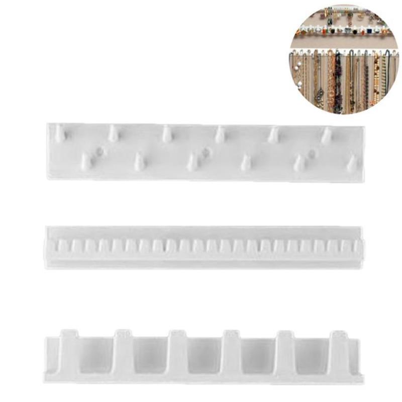 Jewelry Pouches Bags 9pcs/set Hooks Display Organizer Paste Wall Hanging Storage Earring Ring Necklace Hanger Holder StandJewelry
Jewelry Pouches Bags 9pcs/set Hooks Display Organizer Paste Wall Hanging Storage Earring Ring Necklace Hanger Holder StandJewelry