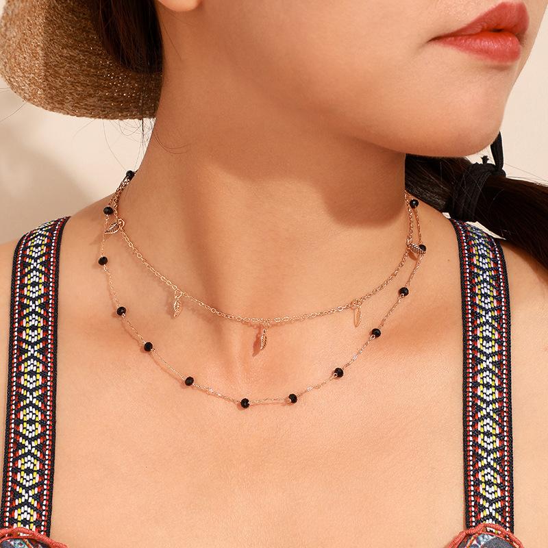 Chokers Double Layered Necklace Women Tassel Charm Choker Black Beads Bohemian Metal Gold Color Party Birthday Gift Fe
Chokers Double Layered Necklace Women Tassel Charm Choker Black Beads Bohemian Metal Gold Color Party Birthday Gift Fe
