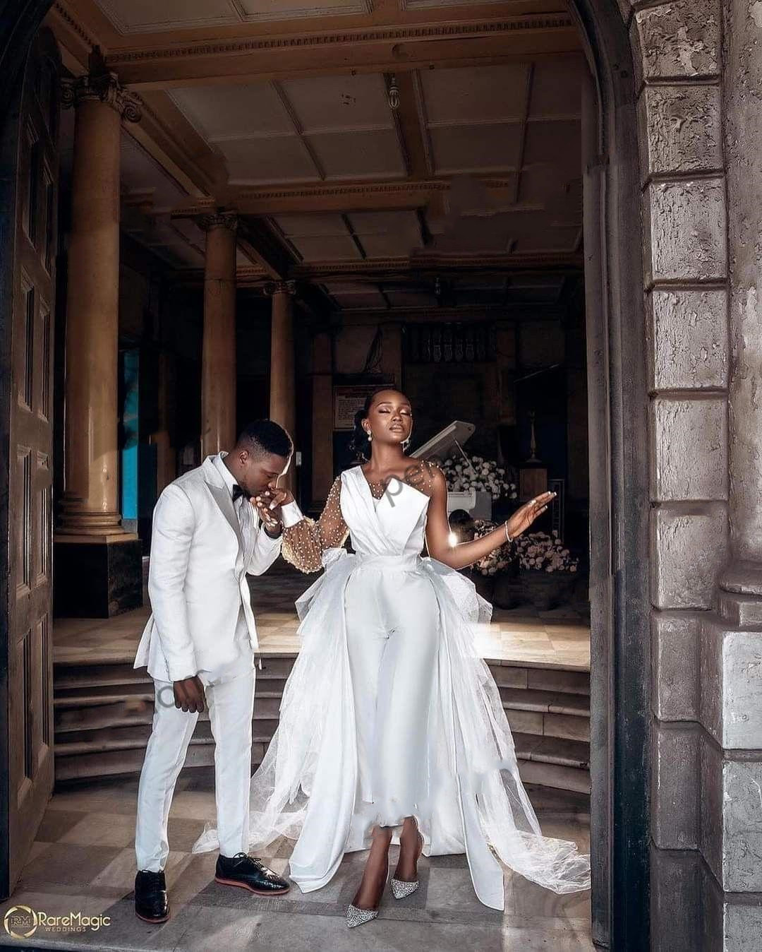 Elegant beach Jumpsuit stain Wedding Dresses Bridal Gowns with Detachable Train Sheer Long Sleeve Beaidng vestido de novia pant suit