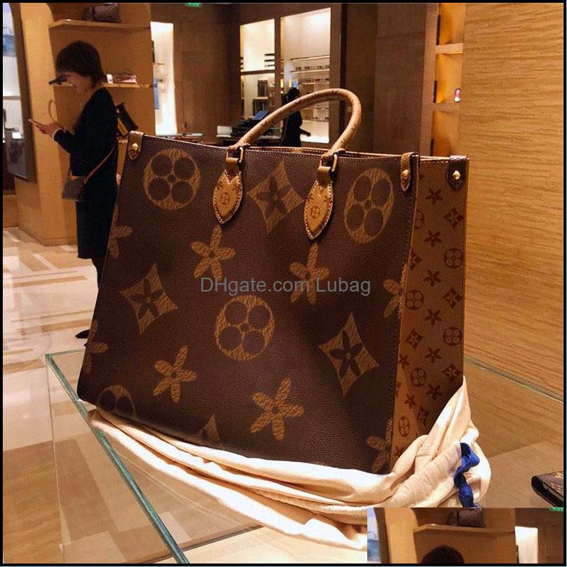 Evening Bags 32X13X26Cm Fashion Designers Brown Flower Handbag Luxurys Handbags High Quality Ladies Big Shoder Bag Leather Drop Lubag Dhsxl, Pink
Evening Bags 32X13X26Cm Fashion Designers Brown Flower Handbag Luxurys Handbags High Quality Ladies Big Shoder Bag Leather Drop Lubag Dhsxl, Pink