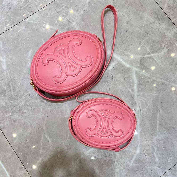 Factory Direct Sale New Brand Ladies Bags Wholesale 2022 Triumphal Arch Cowhide Moon Cake Pig Nose Mini Handbag Small Round Single Shoulder Messenger Mobile, White
Factory Direct Sale New Brand Ladies Bags Wholesale 2022 Triumphal Arch Cowhide Moon Cake Pig Nose Mini Handbag Small Round Single Shoulder Messenger Mobile, White