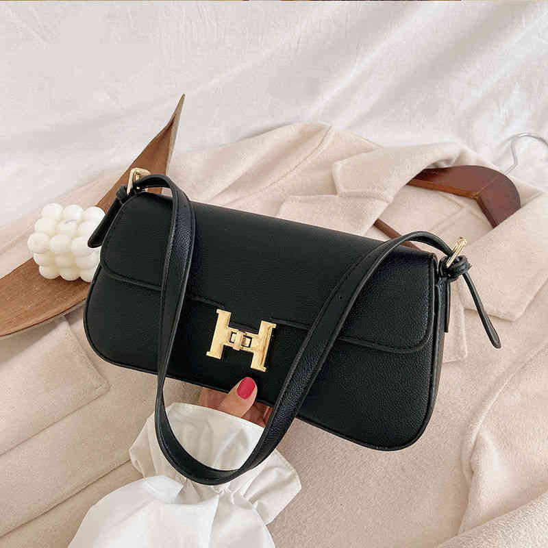 Small fashion h-button armpit club Versatile Single Shoulder Bag advanced sense foreign style bag, Black
Small fashion h-button armpit club Versatile Single Shoulder Bag advanced sense foreign style bag, Black