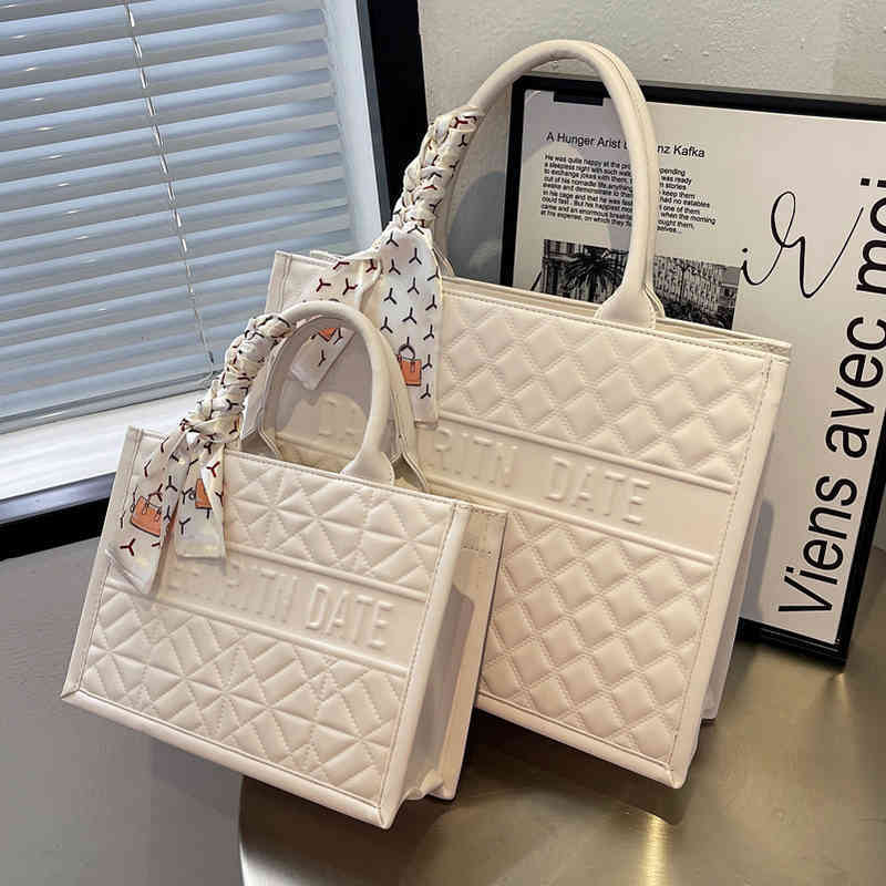 Factory Outlet This year's popular big bag women's 2022 summer new fashion versatile large capacity and texture portable Tote Bag, Rice white bag
Factory Outlet This year's popular big bag women's 2022 summer new fashion versatile large capacity and texture portable Tote Bag, Rice white bag