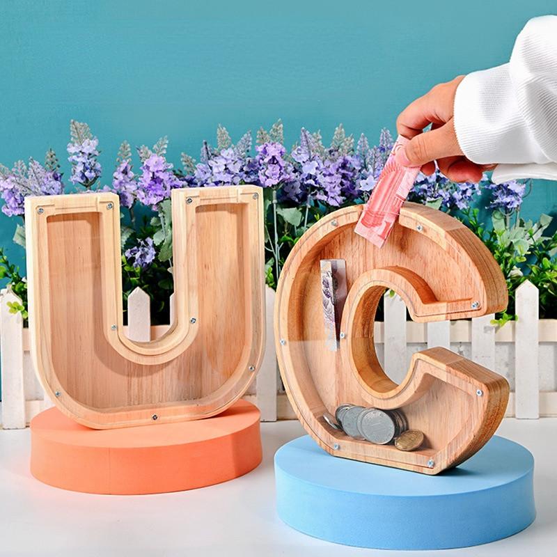 Bandanas Creative English Alphabet Piggy Bank Wooden Transparent Window Meaningful Letters Coin Money Saving Box Home Decor
Bandanas Creative English Alphabet Piggy Bank Wooden Transparent Window Meaningful Letters Coin Money Saving Box Home Decor