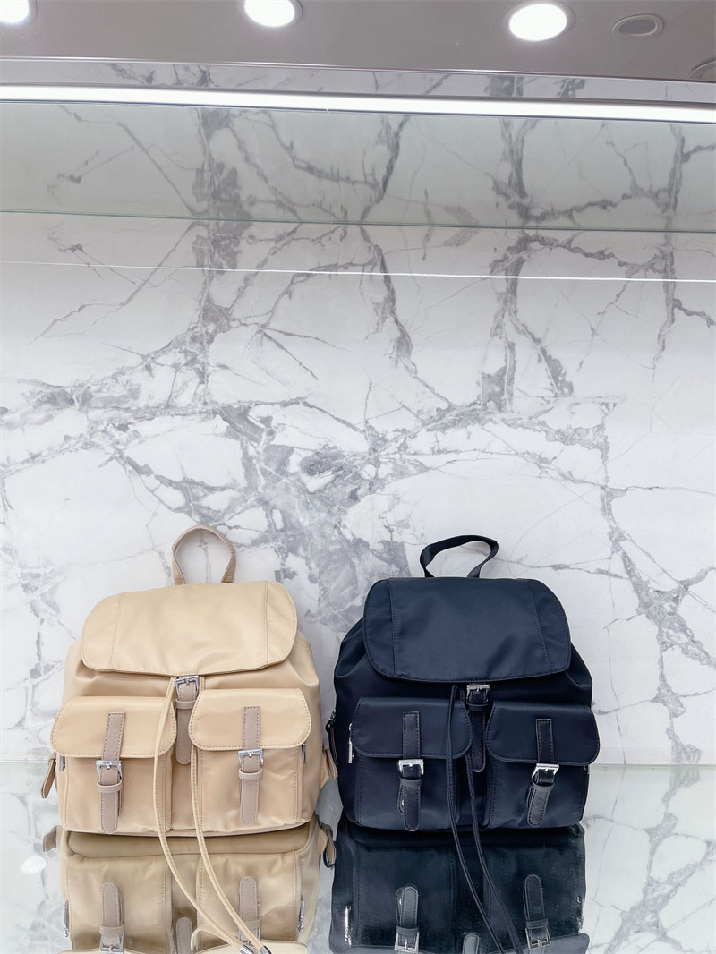 2022 Fashion Unisex Backpacks Designer Top Quality Travel Bags Luxury Small Re-Nylon backpack With multi-pocket Buckle Fastening Two Front Flap Pockets Size 28*28cm, Extra shipping cost
2022 Fashion Unisex Backpacks Designer Top Quality Travel Bags Luxury Small Re-Nylon backpack With multi-pocket Buckle Fastening Two Front Flap Pockets Size 28*28cm, Extra shipping cost