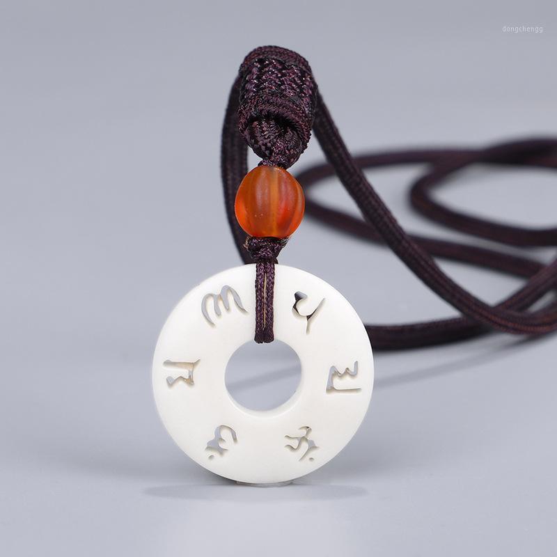 Pendant Necklaces Hollow Tibetan Six Words Necklace For Men Women Handmade Carved Ivory White Tagua Nut OM Mecklace Jewelry Drop
Pendant Necklaces Hollow Tibetan Six Words Necklace For Men Women Handmade Carved Ivory White Tagua Nut OM Mecklace Jewelry Drop