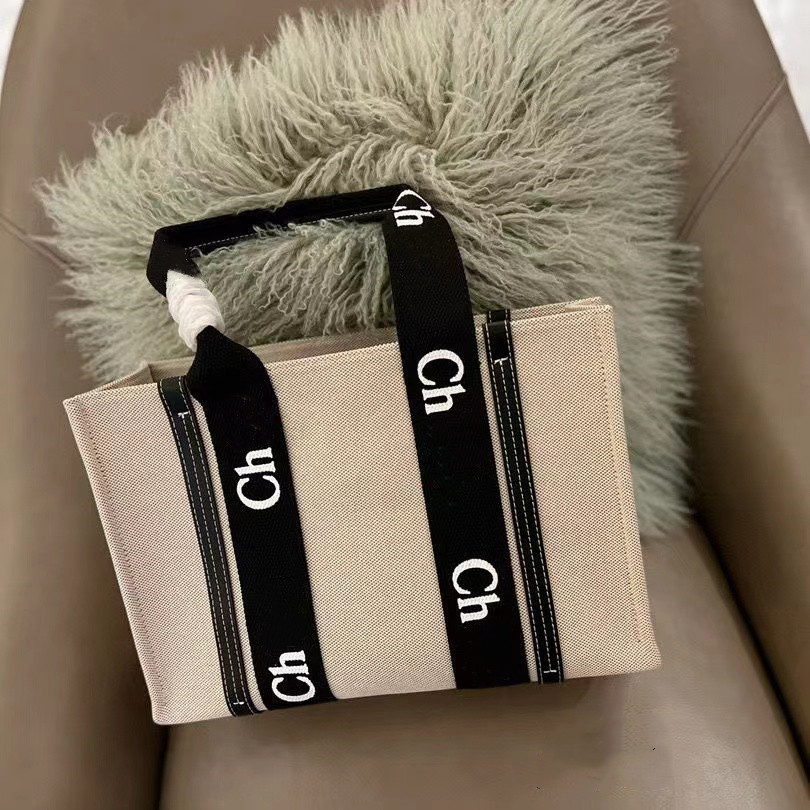 Women 5A quality handbags WOODY Tote shopping bag handbag high NYLON hobo fashion linen Large Beach bags luxury designer travel Crossbody Shoulder bag Purses, Black webbing
Women 5A quality handbags WOODY Tote shopping bag handbag high NYLON hobo fashion linen Large Beach bags luxury designer travel Crossbody Shoulder bag Purses, Black webbing