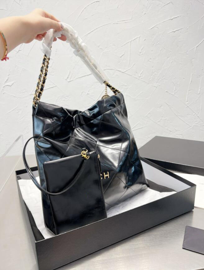The Tote Bag Top quality women's luxury designer handbag with mini purse Two piece stylish large capacity one shoulder slant cross bag 35cm with box
The Tote Bag Top quality women's luxury designer handbag with mini purse Two piece stylish large capacity one shoulder slant cross bag 35cm with box
