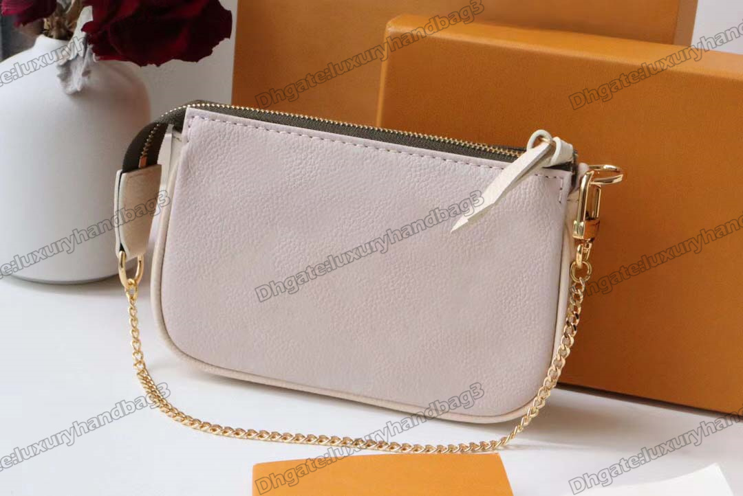 Mini Pochette bag Spring Escape embossed Monograms Empreinte leather two-in-one Multi-function Bags Zipped Pockets Shoulder Bags designers M81284
Mini Pochette bag Spring Escape embossed Monograms Empreinte leather two-in-one Multi-function Bags Zipped Pockets Shoulder Bags designers M81284