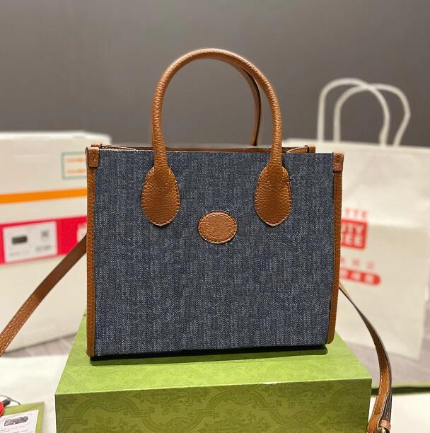 Large Capacity Blue Denim Shopping Bag Tote Bags Handbag Crossbody Purse Shoulder Cowboy Letter Genuine Leather High Quality Totes, Blue(25cm)
Large Capacity Blue Denim Shopping Bag Tote Bags Handbag Crossbody Purse Shoulder Cowboy Letter Genuine Leather High Quality Totes, Blue(25cm)
