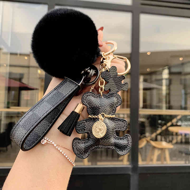 Luxury Ladies Keychain High Quality Leather Tassel Hair Ball Pendant Trendy Fashion Car Key chain Charm Jewelry Holde
Luxury Ladies Keychain High Quality Leather Tassel Hair Ball Pendant Trendy Fashion Car Key chain Charm Jewelry Holde