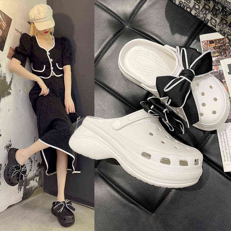 Sandals Women High Heels Solid Color Baotou Slippers New Summer Fashion Bow Beach Sandals Hole Shoes 220412, Black
Sandals Women High Heels Solid Color Baotou Slippers New Summer Fashion Bow Beach Sandals Hole Shoes 220412, Black