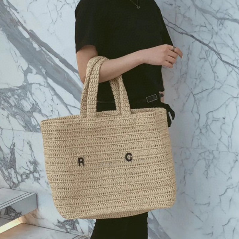 2022 Designer Brands Hollow Letters Raffia Straw Tote Fashion Woven Khaki Shoulder Bag for women Summer new beach bags metal hardware Luxury Shoulder Handbag
2022 Designer Brands Hollow Letters Raffia Straw Tote Fashion Woven Khaki Shoulder Bag for women Summer new beach bags metal hardware Luxury Shoulder Handbag