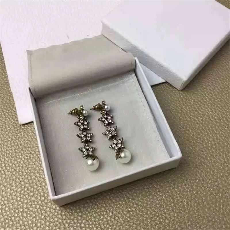 High quality Designer Charm Earrings water drill silver needle family pearl bee five pointed star for women luxury wedding jewelry
High quality Designer Charm Earrings water drill silver needle family pearl bee five pointed star for women luxury wedding jewelry