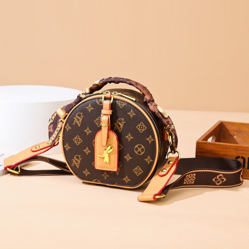 Wholesale factory ladies brand leathers shoulder bags sweet cute cartoon round bag classic printing retro handbag street personality contrast leather backpack
