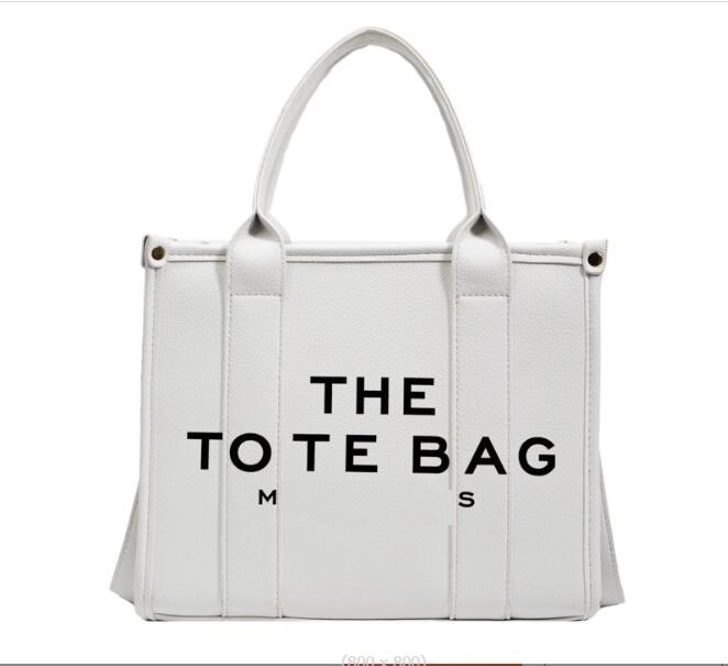 2065 Fashion Marc Women's Handbag with The Tote Bag Letters Printing leather Shoulder Bag Multi Colors Messenger Bags Totes Logo 26CM
2065 Fashion Marc Women's Handbag with The Tote Bag Letters Printing leather Shoulder Bag Multi Colors Messenger Bags Totes Logo 26CM